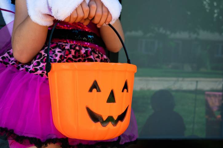 The traditional orange trick-or-treating jack-o-lantern.